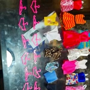 Clothes for Barbie and clothes hangers